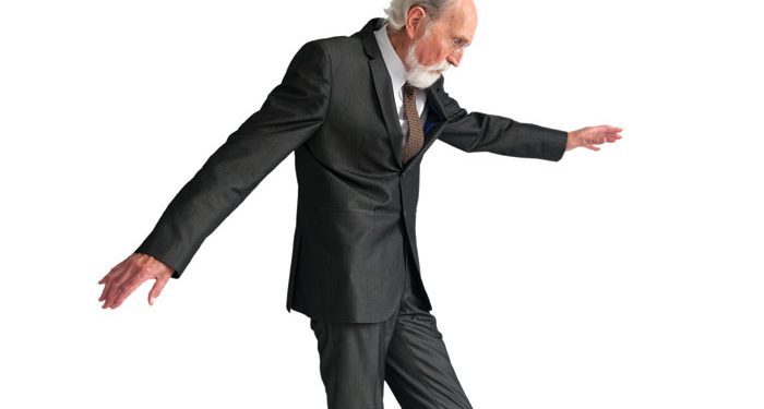 Old man on tightrope