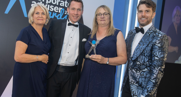 Barnett Waddingham's Mark Futcher and Julia Turney collect the award for Corporate Adviser Firm of the Year from LGIM's Rita Butler-Jones and Joel Dommett
