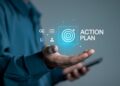 Action plan concept. Business and marketing, objective, strategy, Plan and implementation. Person holding action plan icon on virtual screen for Strategic, Vision, Planning and Direction.